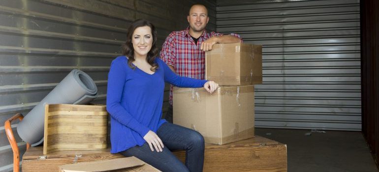 a couple with boxes