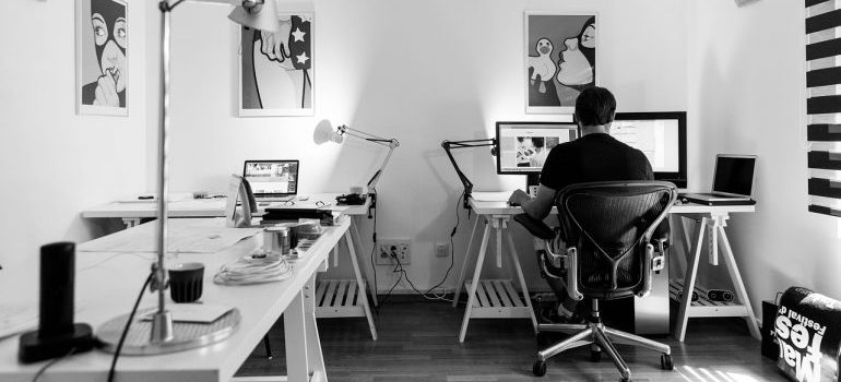 A man sitting in an office.