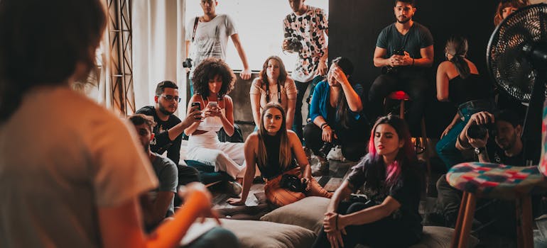 A group of people sitting in the room after an office move in Manhattan