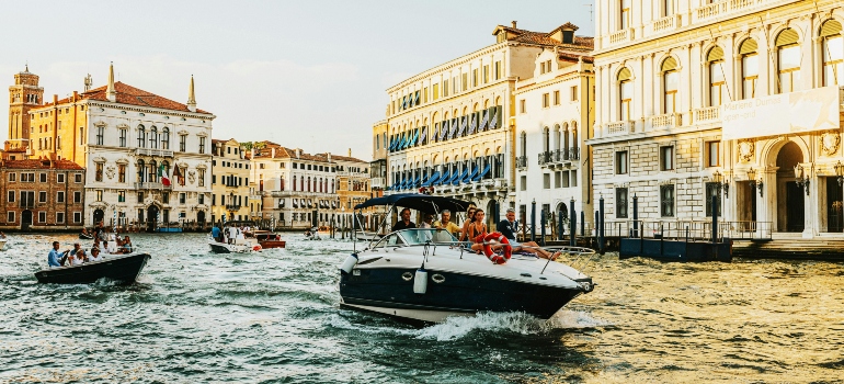 Boats gliding through Venice’s canals, creating memories of romance and adventure.